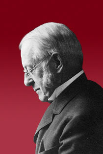 Graphic of President Eliot against a crimson background.