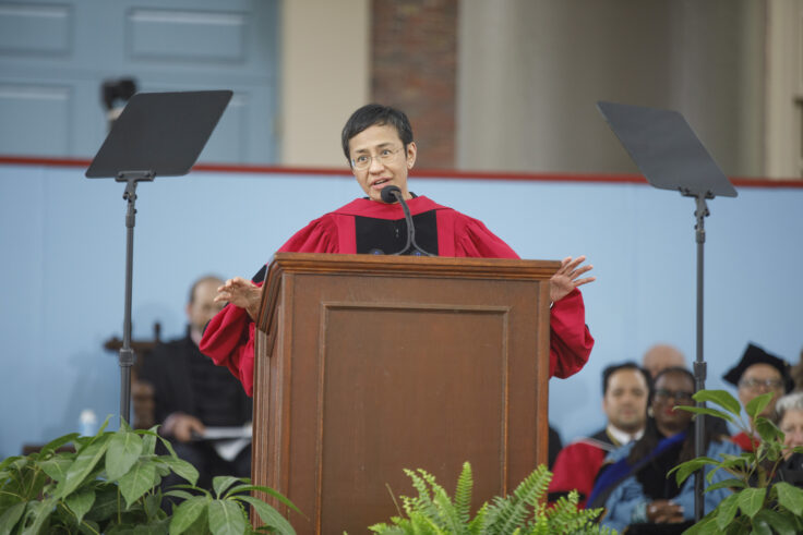 Maria Ressa at the podium during Harvard's Commencement